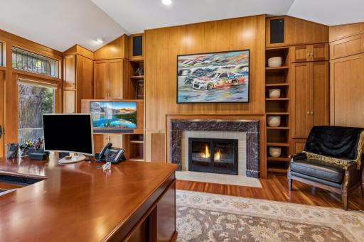 Wood burning fireplace and built in cabinets throughout