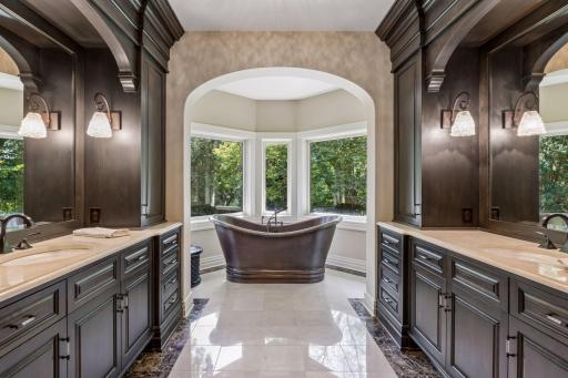 Features include double sinks, dual vanities, and heated floors.
