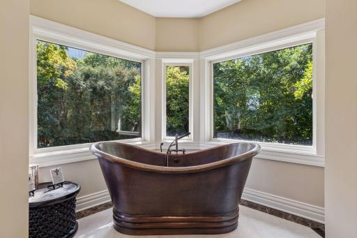 Copper soaking tub with picturesque private views
