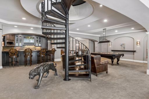 Spiral staircase in the center of the rec room