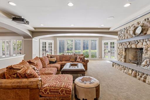 Stone surround wood burning fireplace