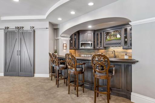 Lower level second kitchen with barstool seating