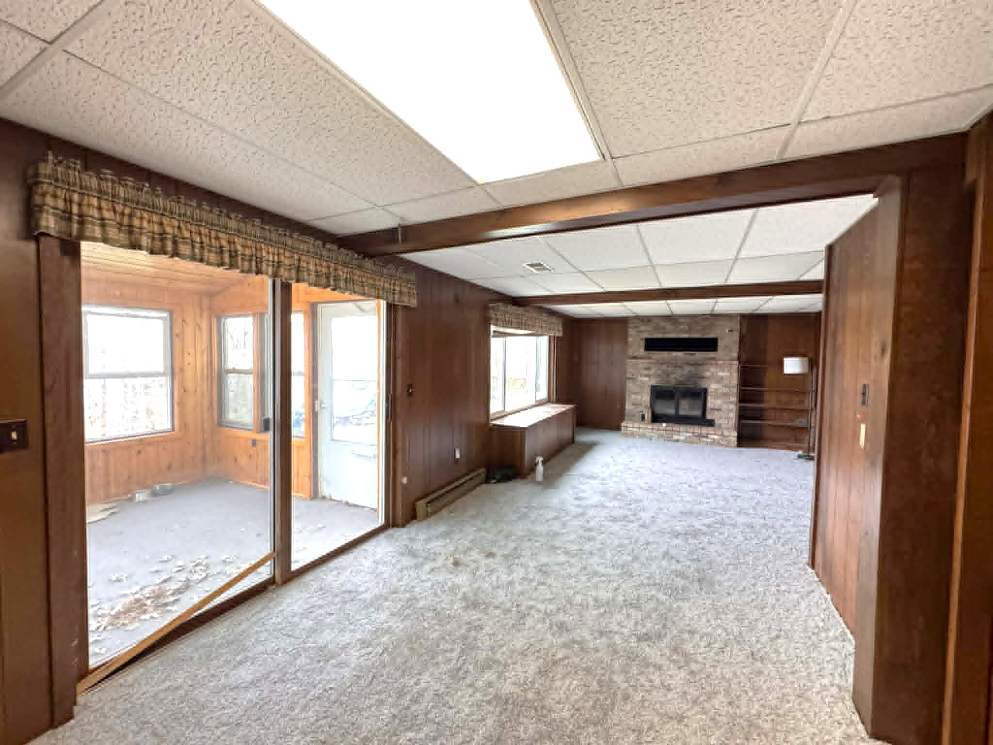Lower level with 3 season porch.jpg