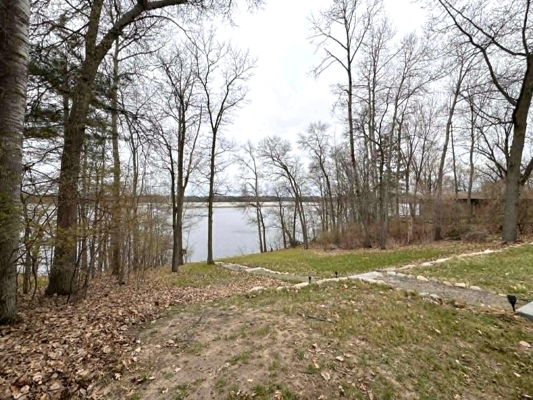 Backyard with gentle slope to river.jpg