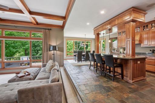 Expansive main level floor plan, stunning slate tiled flooring beautifully complements the homeâs elegant cherry woodwork, adding warmth, texture, and timeless character.
