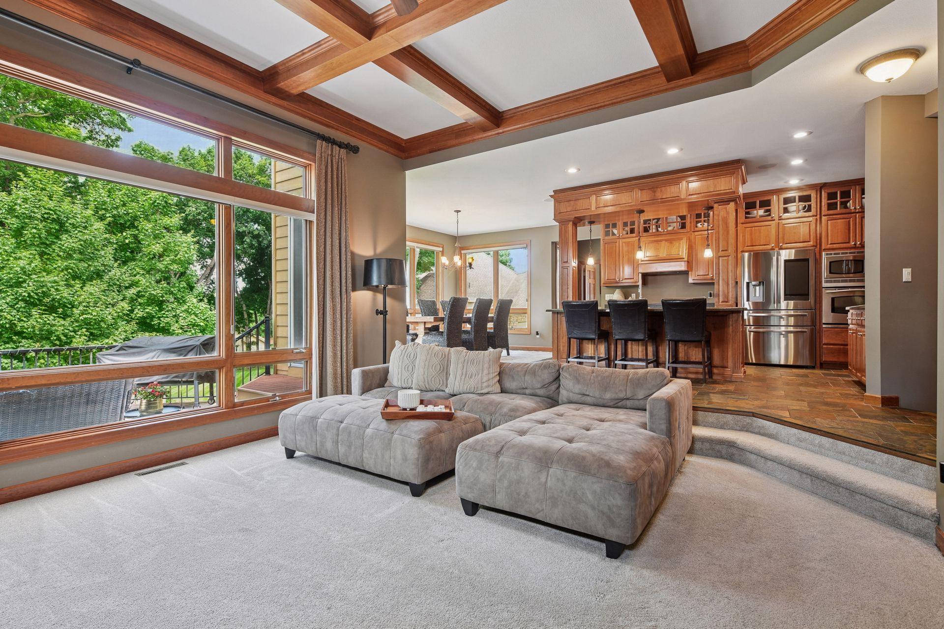Towering ceilings create a seamless, open main level.