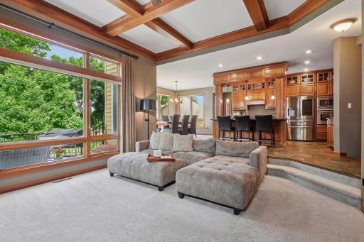 Towering ceilings create a seamless, open main level.