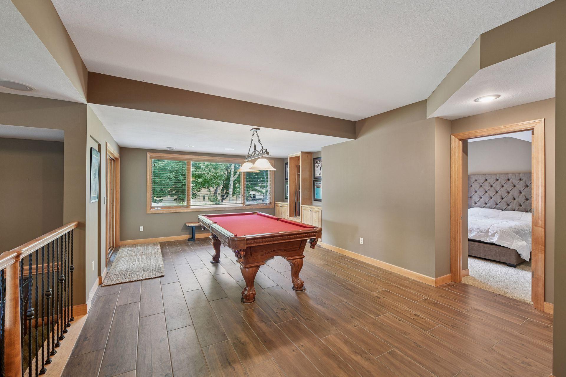 Game night anyone?! Great space to entertain, walk out to private, under deck patio!