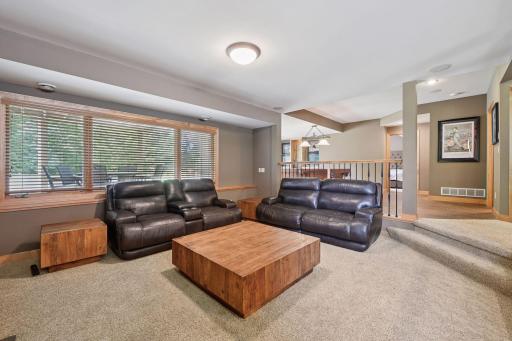 Thoughtfully designed for comfort, functionality, and entertainment with multiple gathering spaces, custom finishes, and walkout access to the backyard retreat. Ideal for hosting guests, multigenerational living, or creating the ultimate media space.