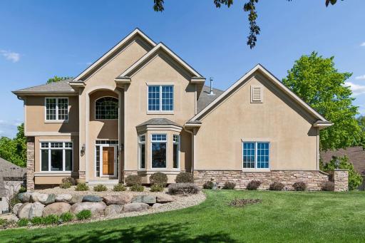 Stately and architecturally striking in one of Prior Lake's most sought after areas. Impressive exterior with stunning stone accents and natural stone landscaping.