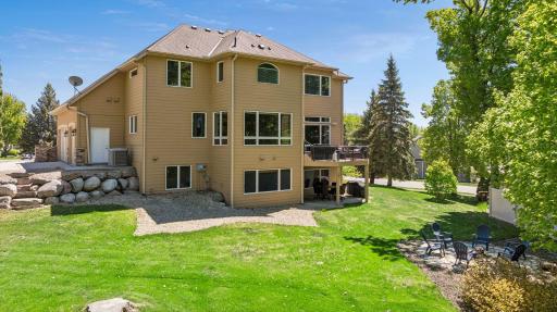 Windows, windows and more windows bring a ton of natural light inside! Outdoor spaces offer perfect entertaining - deck, under deck patio and firepit. The stone landscaping that surrounds this lot is amazing!