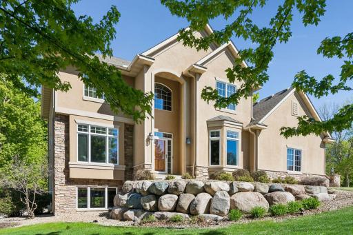 Custom built two-story offering timeless natural woodwork, rich wood detailing, and expansive gathering spaces in one of Prior Lakeâs most established executive neighborhoods, The Wilds! Must see in person - built to impress.