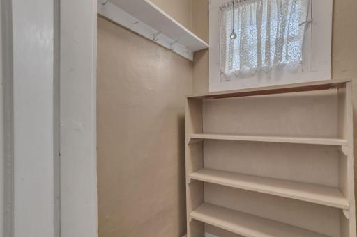 Tucked off the corner of the kitchen is the pantry.
