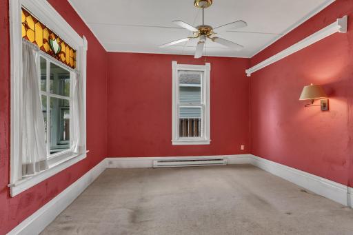 With original leaded glass window and high ceilings - this house has the charm and character of yesteryear.