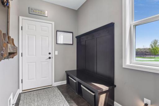 Mudroom off the garage with tons of storage (not pictured is a walk-in closet with custom shelving for ultimate organization). Not shown is the 3-car heated and epoxied garage