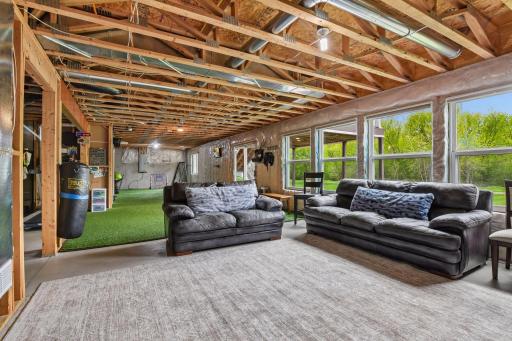 While technically unfinished (and not counted in the total square footage) the walkout lower level is incredibly usable and functional. The current owners use it as a family room, kids' sports area, workshop, home office, and home gym!