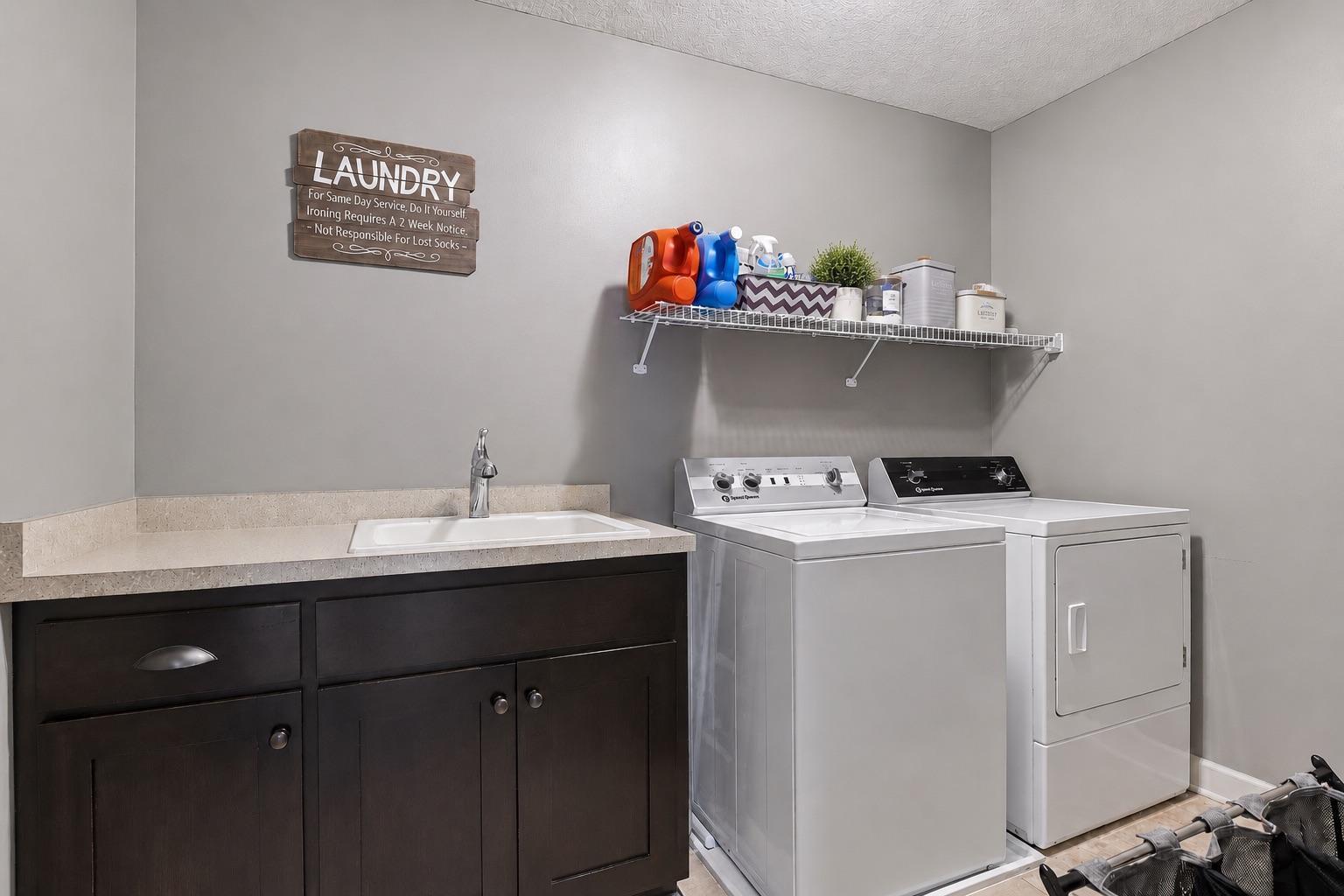 Convenient laundry room located on the upper level