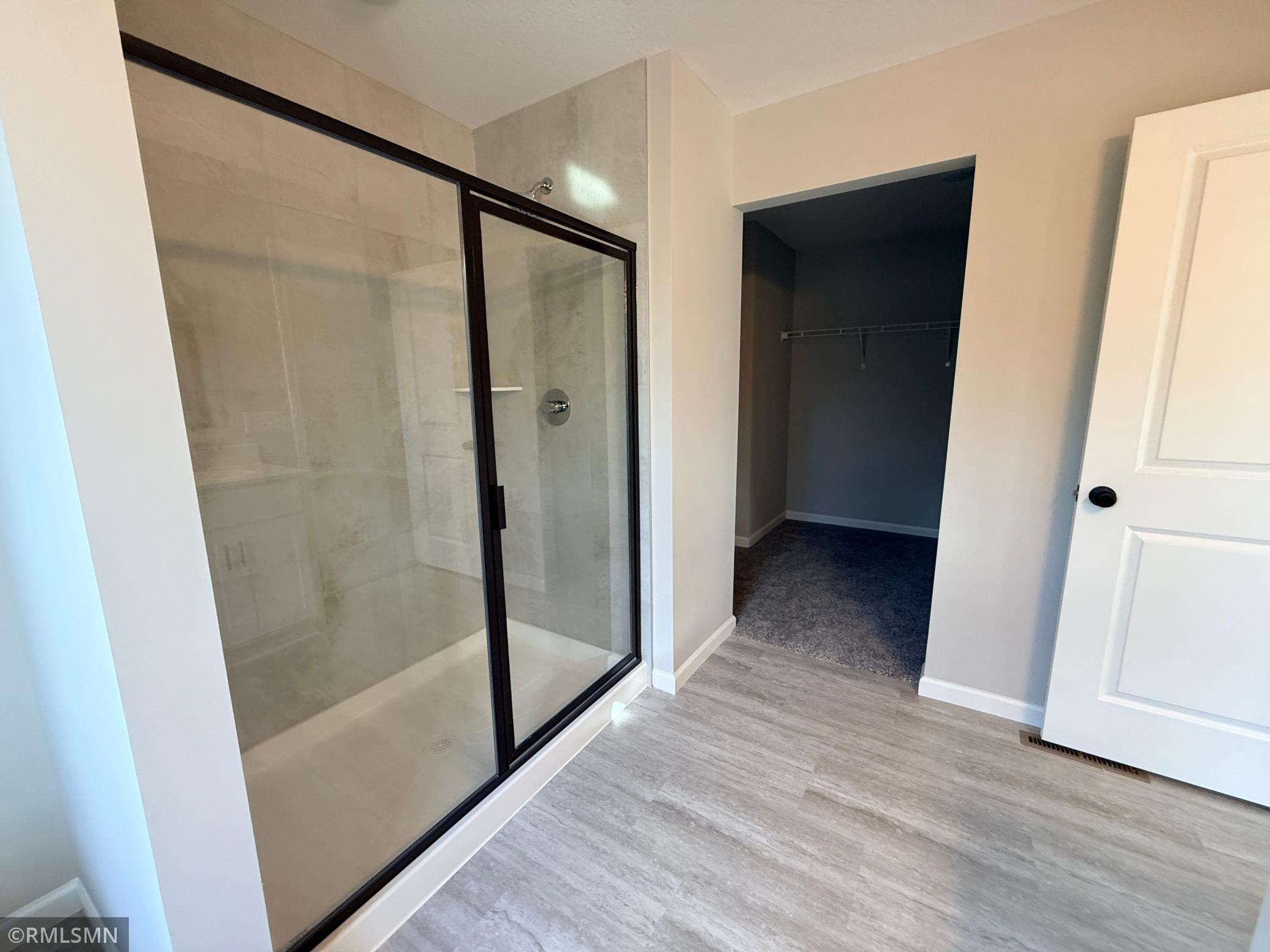 An oversized tile shower adds the perfect touch
