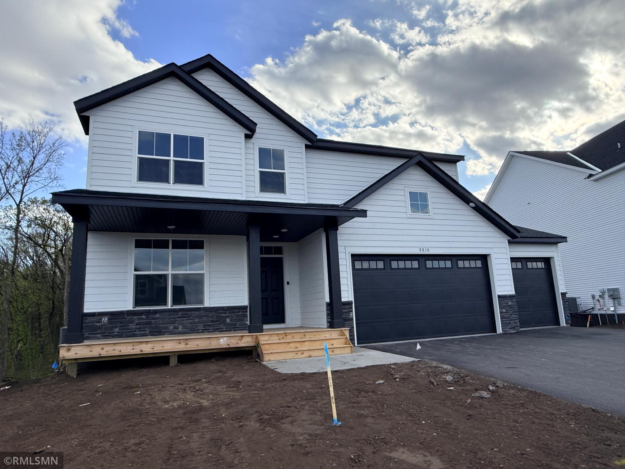 This super sharp exterior will have inground irrigation and sod installed soon!