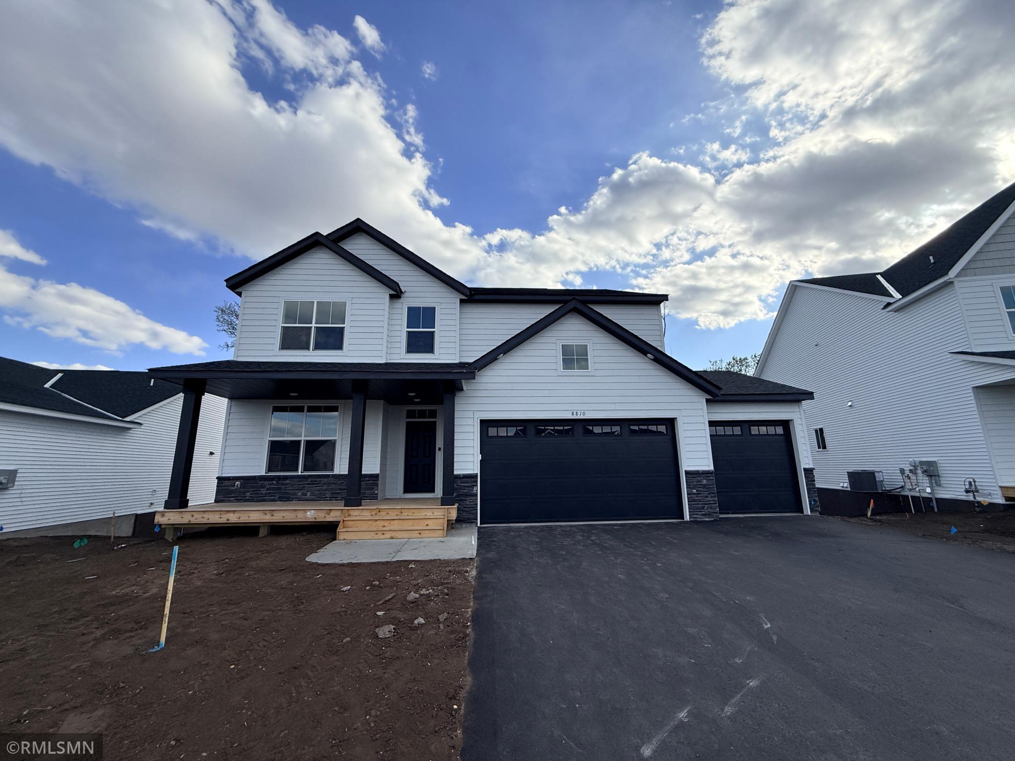 This super sharp exterior will have inground irrigation and sod installed soon!