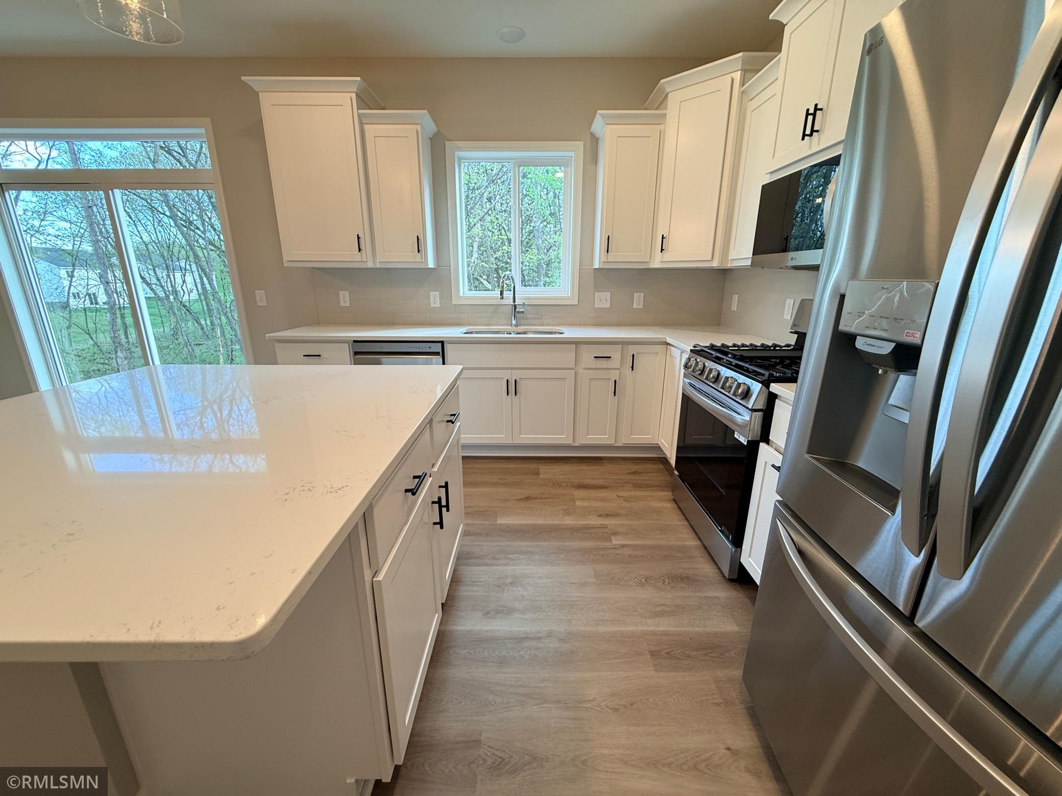 Storage abounds thanks to many different sizes of cabinets and drawers.