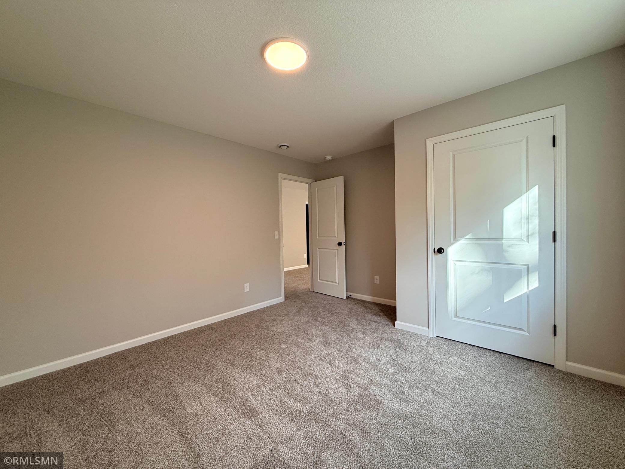 This additional lower level bedroom is bedroom total #5