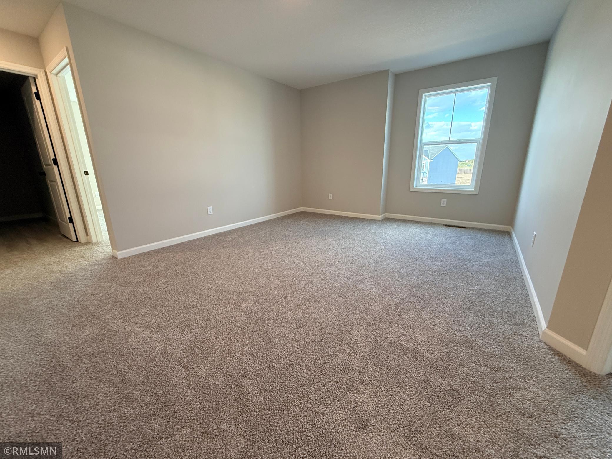 Another view of the loft - a reading nook would look great by this large window