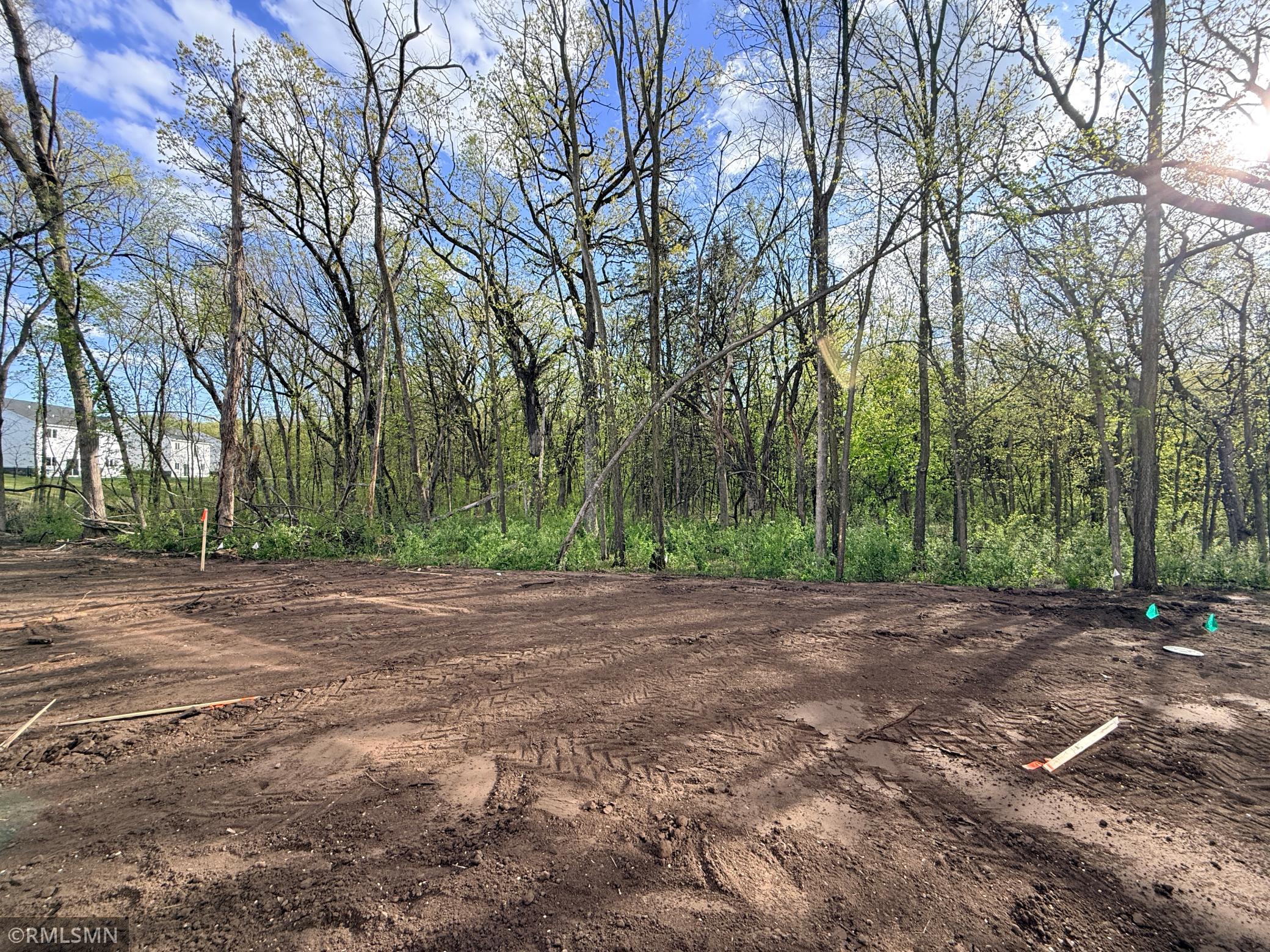 Gorgeous backyard includes a huge section of mature trees! Sod will be installed soon!