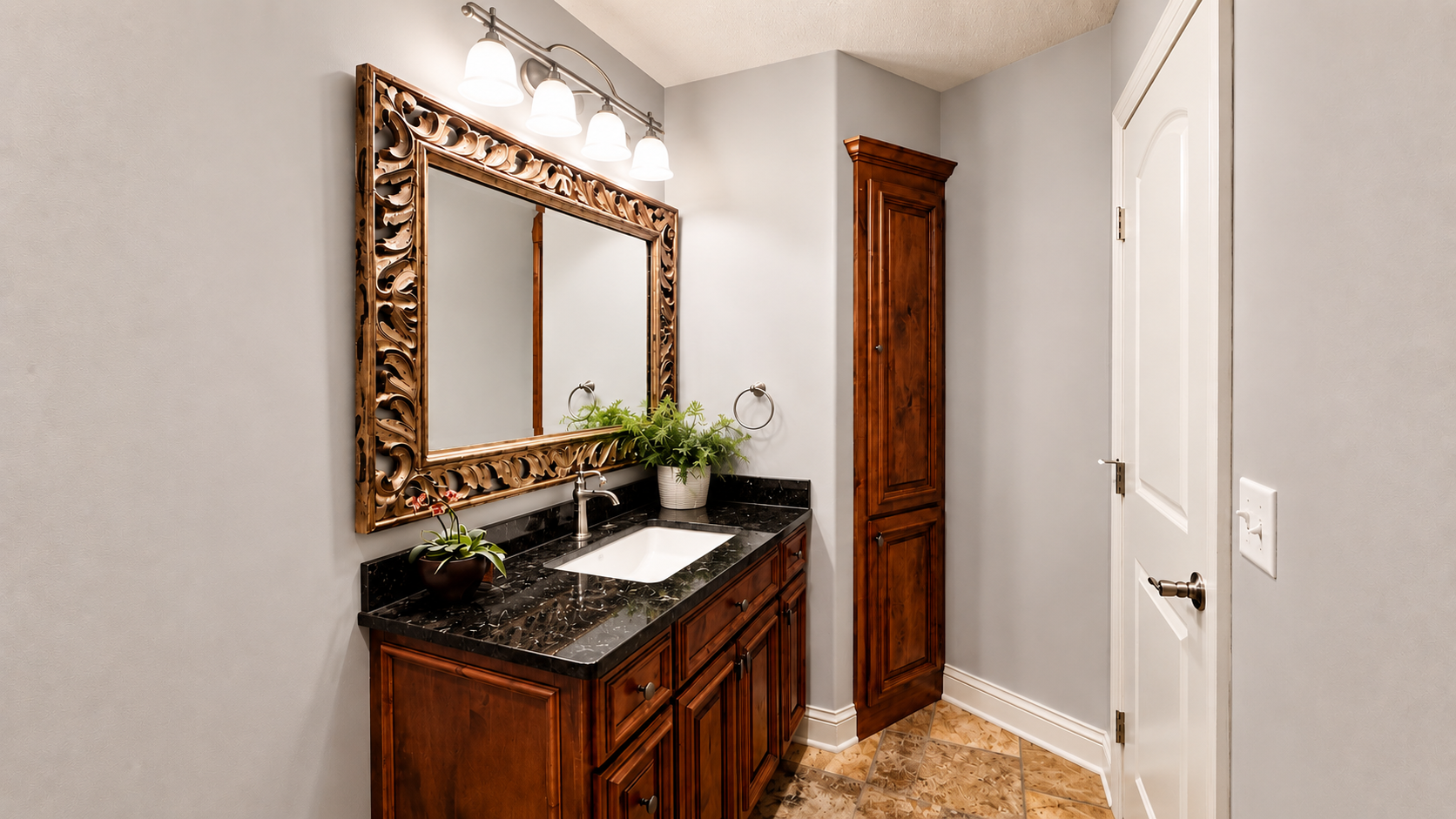 8140 134th St W - Basement half bathroom with granite counters, travertine tiled floors, and built-in linen closet featuring knotty alder wood.