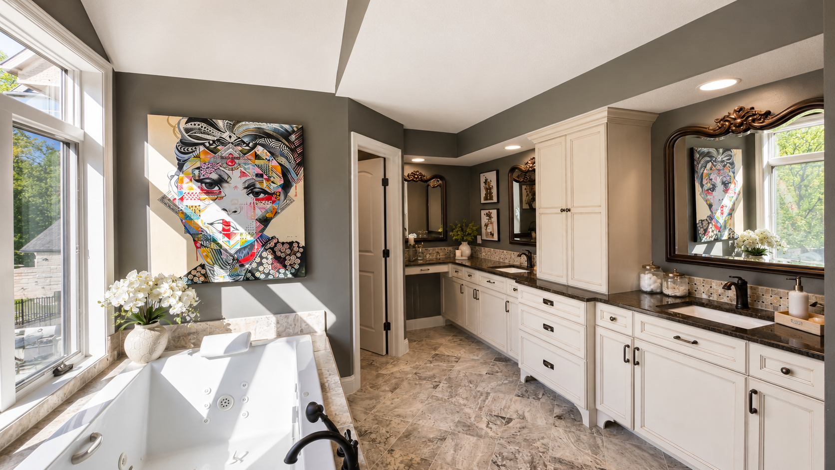 8140 134th St W - Custom owner's suite private bathroom featuring tiled floors, custom tile detailing, granite counter tops with oil-rubbed bronze fixtures, built-in linen closet and vanity.