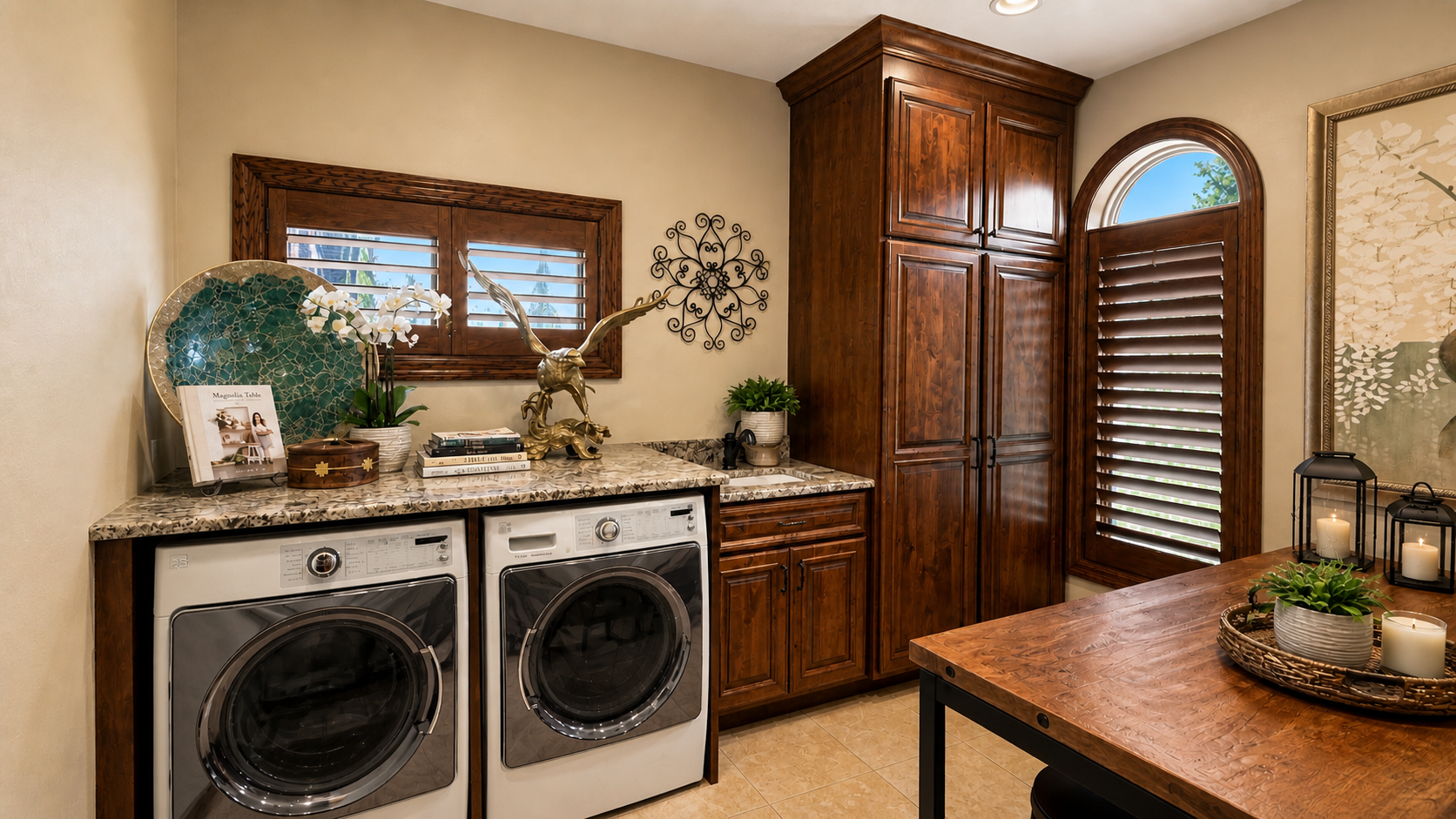 8140 134th St W - Main floor office combination with main floor laundry including built-in storage and composite laundry sink with beautiful granite counter tops and tiled floors. Ample storage available here!