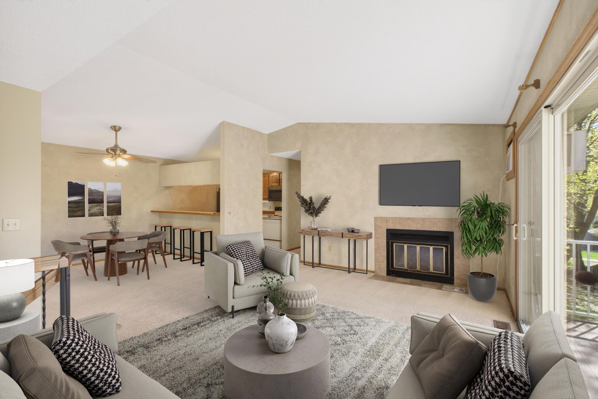 Vaulted ceilings and large windows in the main living area. Virtually Staged.