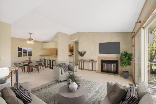 Vaulted ceilings and large windows in the main living area. Virtually Staged.