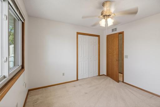 Second bedroom ideal for guests, office, or flex space