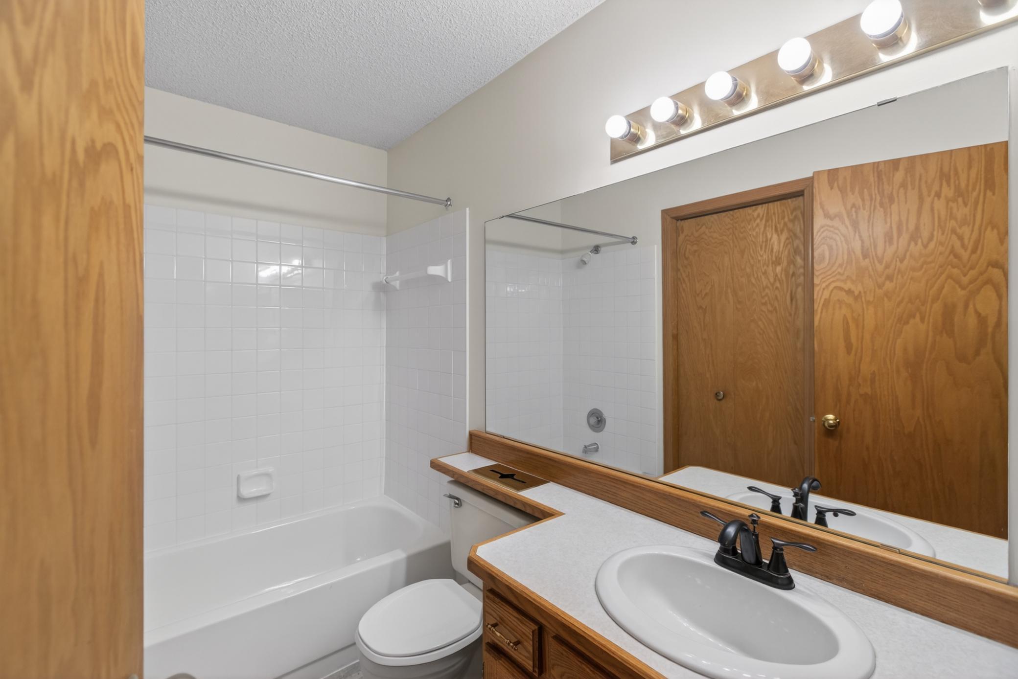 Updated main bath with new tile surround