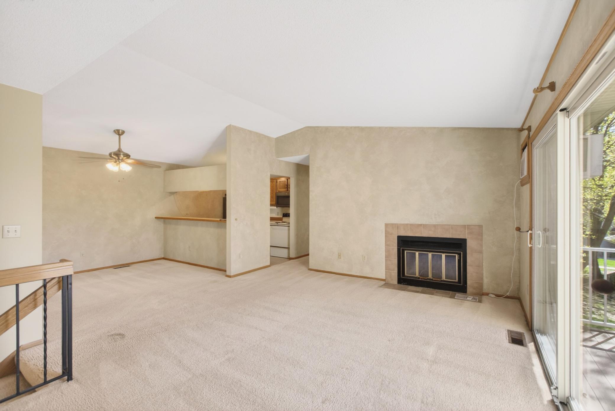 Open-concept layout connecting kitchen, dining, and living spaces