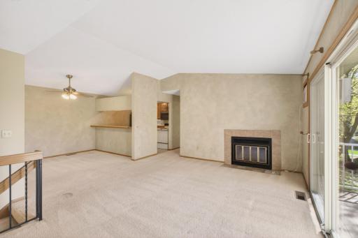 Open-concept layout connecting kitchen, dining, and living spaces