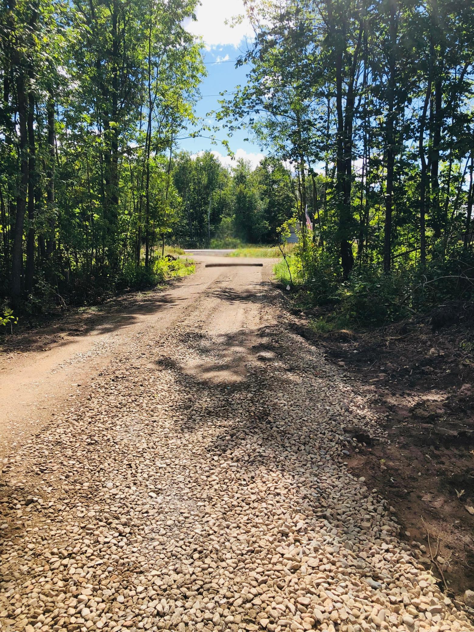 View to Nature Avenue (County Rd. 5) from driveway