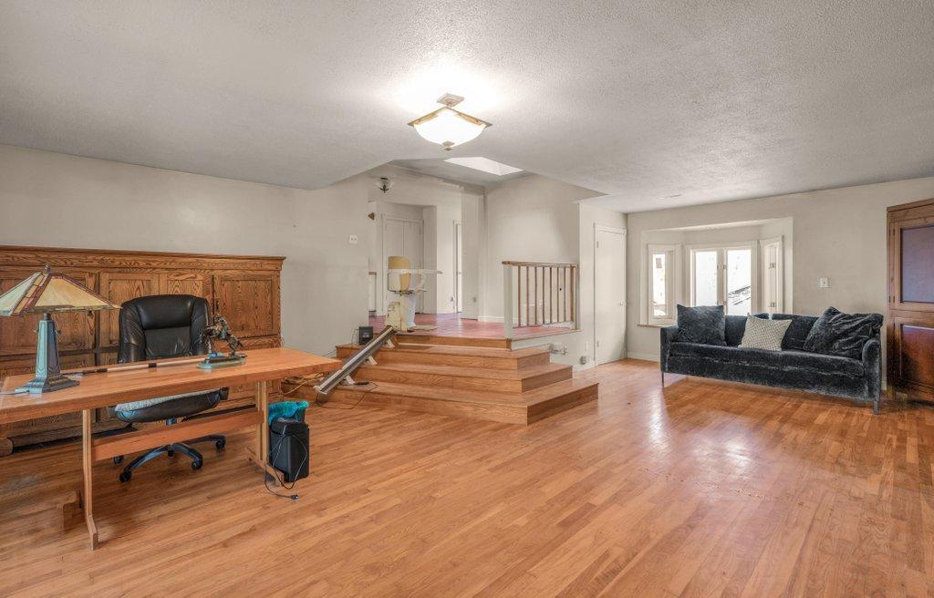 Large Main Floor Family Room with Beautiful Hardwood Floors!
