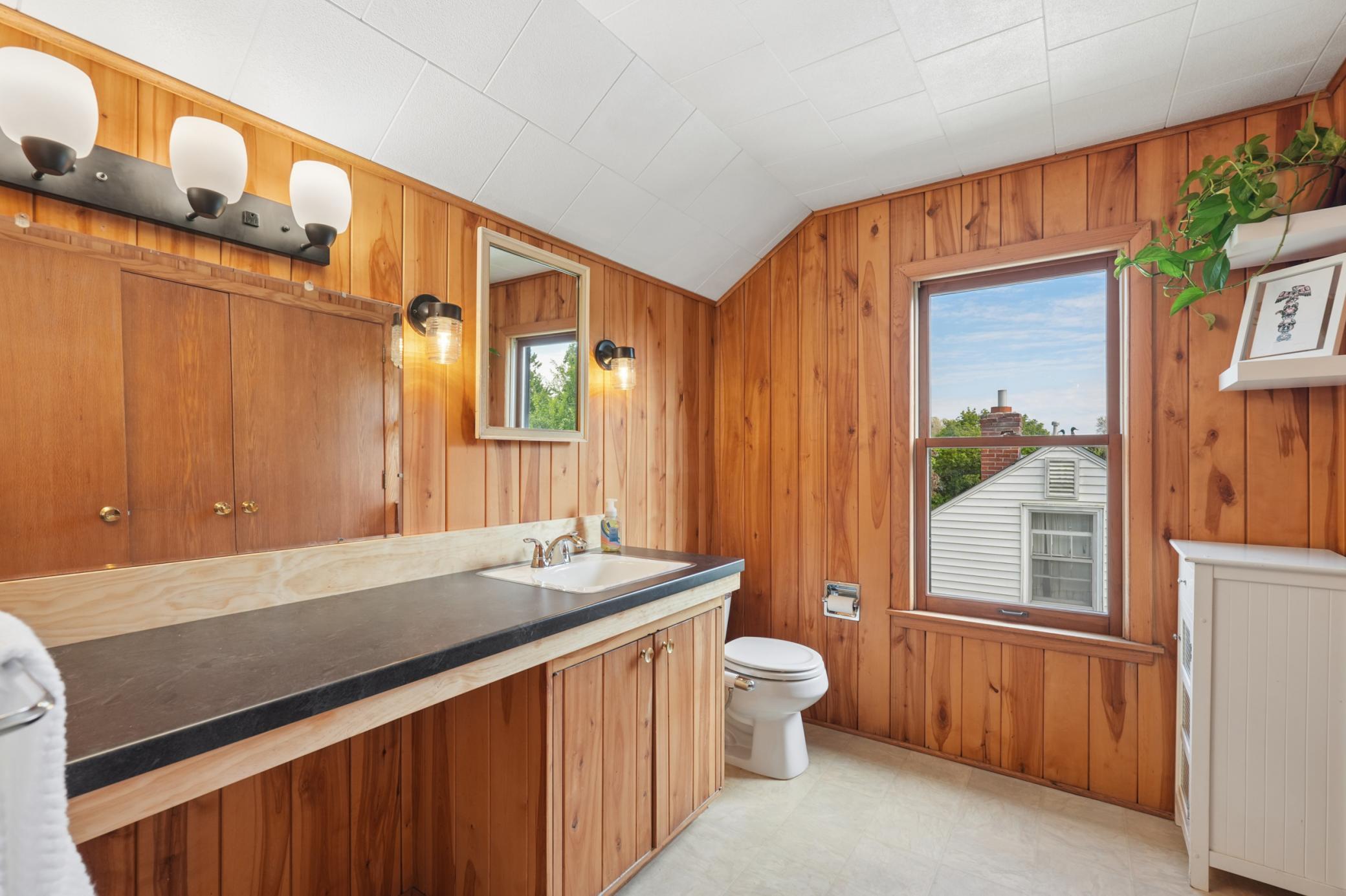 Half bath on second floor has enough space for the addition of a shower or tub to make a full primary bath suite