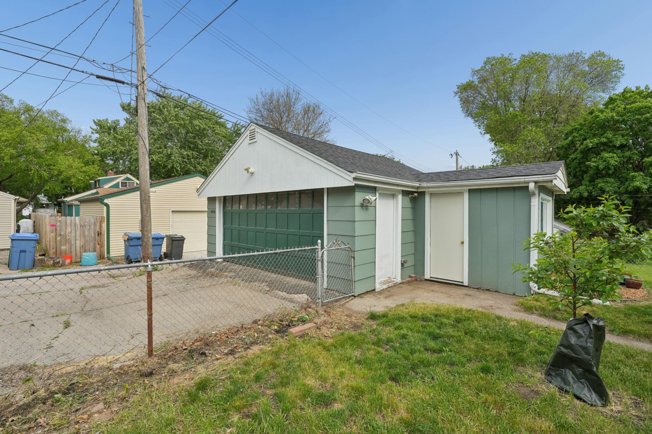 2 car garage with attached potter's shed for extra storage