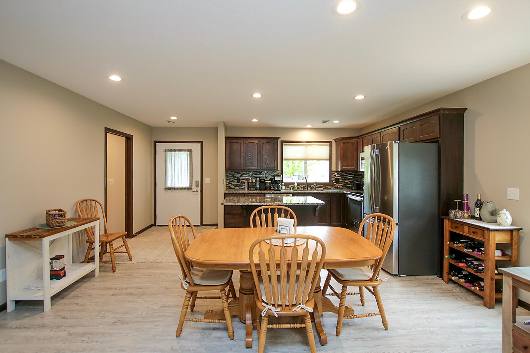 This home was built with accessibility in mind with extra wide doors and doorways. The laundry is located off the garage and kitchen areas.