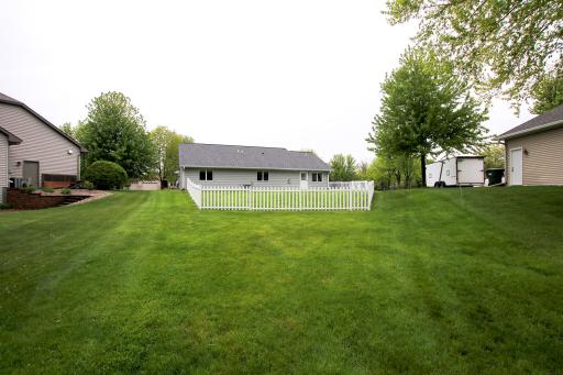 The backyard is much larger than the fenced area providing room for an extra storage shed, garden or other hobbies.