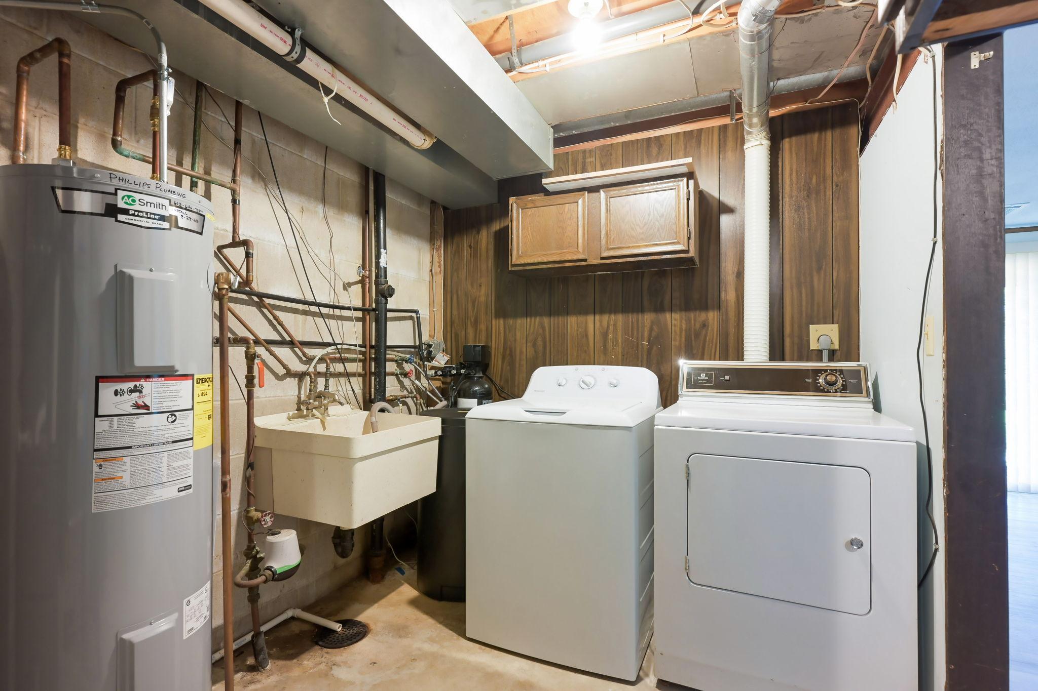 A half bath is R/I to be finished by buyer. The expensive part is done!