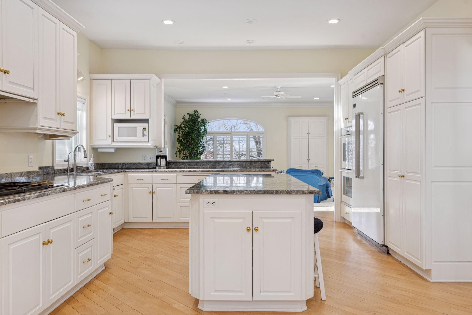 Double wall ovens and two refrigerators add serious convenience, especially for larger gatherings and busy households