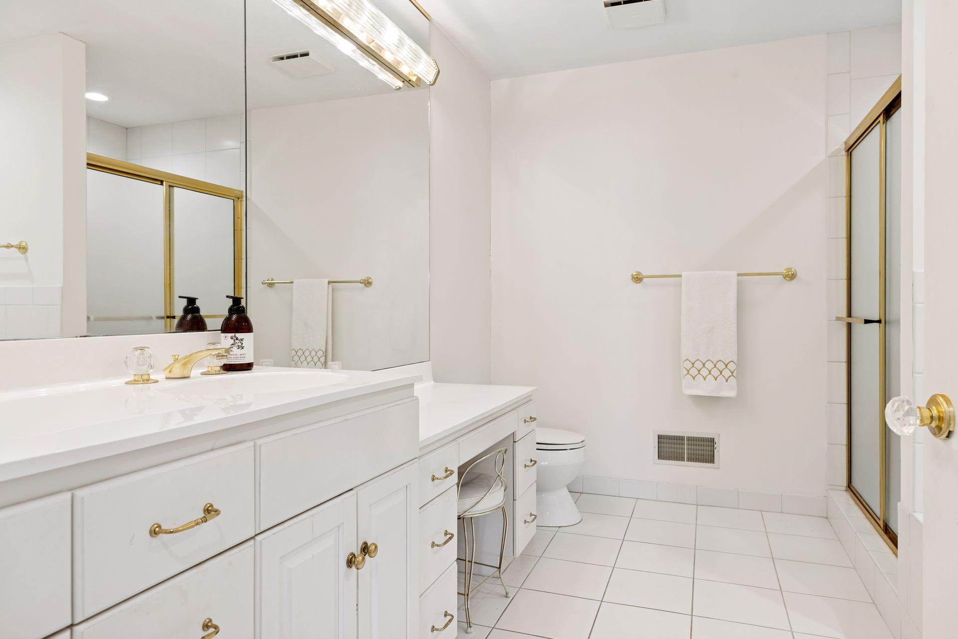 Primary suite features 2 private en-suite bathrooms each with it's own walk-in closet