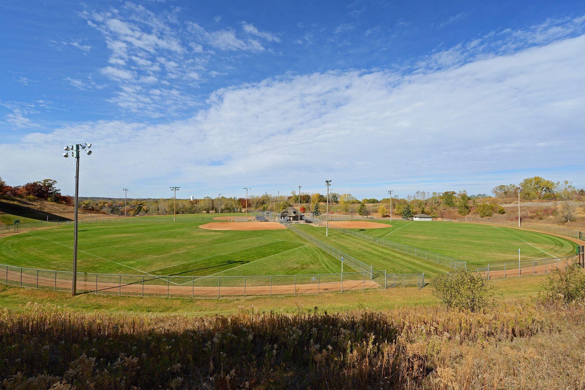 Nearby Van Valkenburg Park features softball fields and an off leash dog park