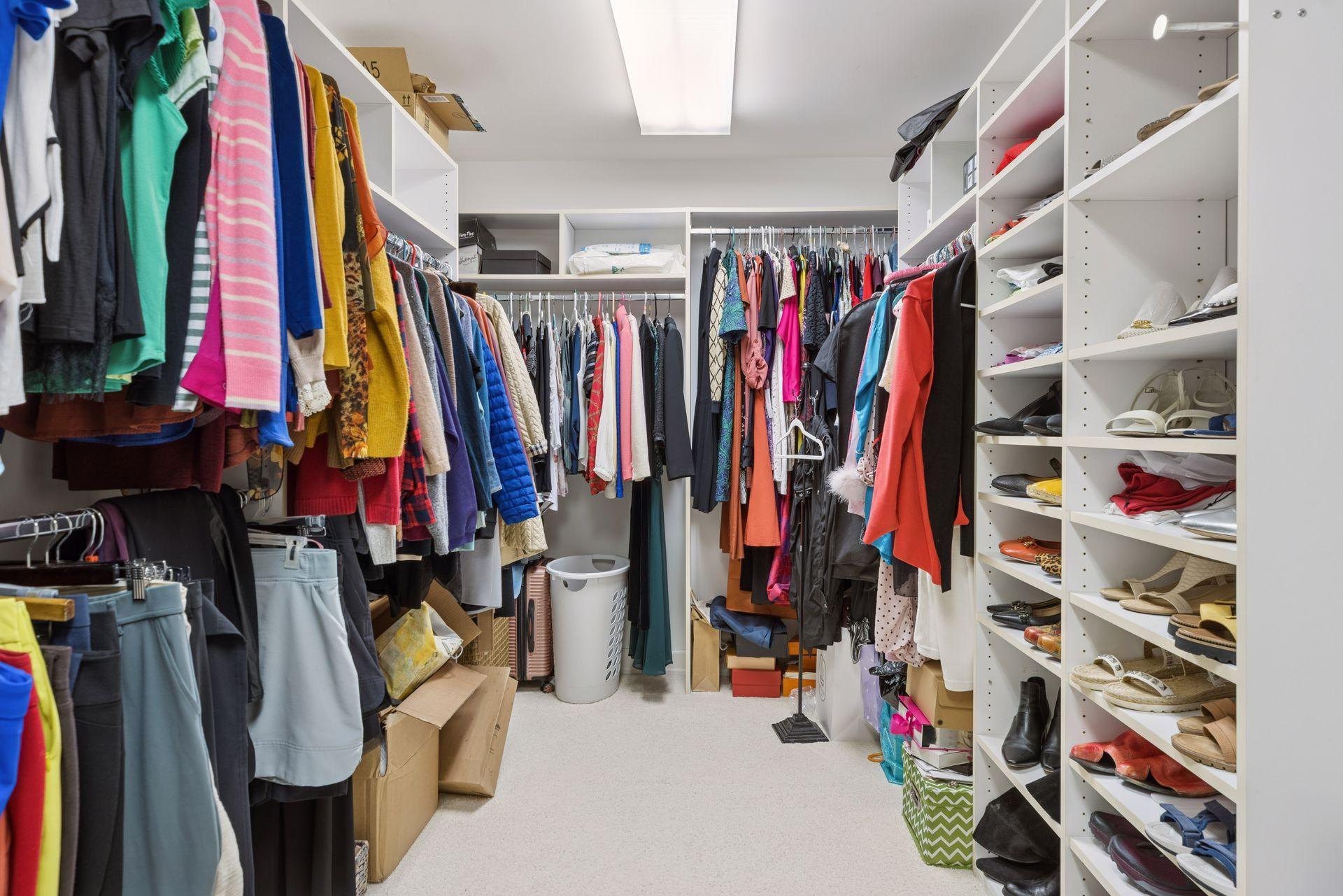One of 2 walk-in closets in the primary suite