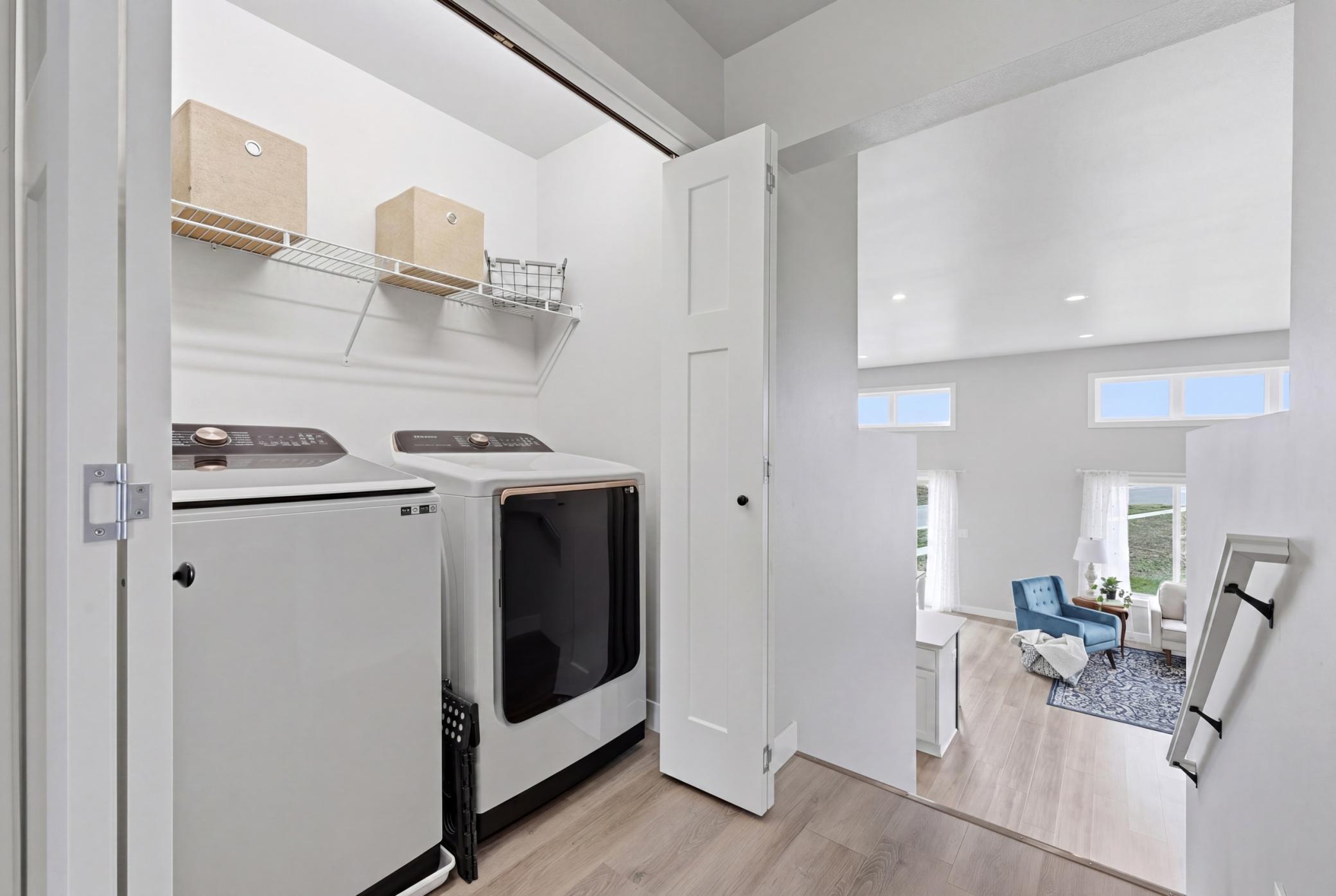 Laundry Room Upper Level - Laminated Vinyl Plank In Hallway, Laundry and Bathroom for Function and Durability