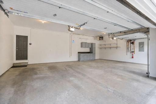 Heated, insulated 3-car garage with electric and storage